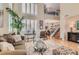 Spacious living room with an open floor plan, providing a seamless flow between living and dining areas at 1667 Sabatini Dr, Henderson, NV 89052