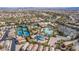 Community aerial view featuring tennis courts, a large pool, water slides, and well-maintained landscaping at 190 Tall Ruff Dr, Las Vegas, NV 89148