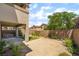 Inviting backyard featuring both gravel and grass areas, complete with a covered patio perfect for relaxing outdoors at 190 Tall Ruff Dr, Las Vegas, NV 89148