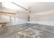 Spacious, clean garage with ample room for parking and storage, featuring a utilitarian design at 190 Tall Ruff Dr, Las Vegas, NV 89148