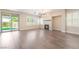 Spacious living room featuring a fireplace, neutral paint, and sliding glass doors to the backyard at 190 Tall Ruff Dr, Las Vegas, NV 89148