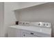 Laundry room with a white washing machine and dryer at 201 Mission Laguna Ln # 104, Las Vegas, NV 89107