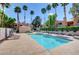 Inviting community pool with plenty of seating for residents to relax and enjoy the sun at 201 Mission Laguna Ln # 104, Las Vegas, NV 89107
