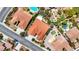 From above, this neighborhood features terracotta roofs and well-manicured lawns, with swimming pools in the backyard at 2175 Sandstone Cliffs Dr, Henderson, NV 89044