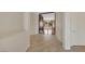 Light and bright entryway featuring ceramic tile flooring and an open doorway to the living space at 2175 Sandstone Cliffs Dr, Henderson, NV 89044