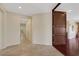 Inviting entryway with tile flooring, decorative molding, and a grand wooden door at 2175 Sandstone Cliffs Dr, Henderson, NV 89044