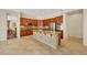 Open kitchen featuring a center island with granite countertops and stainless steel appliances at 2175 Sandstone Cliffs Dr, Henderson, NV 89044