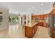 Kitchen with island, stainless steel appliances, and granite countertops at 2175 Sandstone Cliffs Dr, Henderson, NV 89044