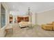 Open floor plan showcasing kitchen with granite countertops and adjacent living room at 2175 Sandstone Cliffs Dr, Henderson, NV 89044