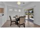 Cozy dining area with modern table and access to the outdoor space at 2323 Barbers Point Pl, Las Vegas, NV 89134