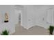 Bright entryway with decorative plants and tile flooring leading into the home at 2323 Barbers Point Pl, Las Vegas, NV 89134