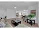 Open-concept living area featuring tile flooring and plenty of natural light at 2323 Barbers Point Pl, Las Vegas, NV 89134