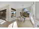 Bright dining area features a modern chandelier, and picturesque backyard views at 2621 Spalding Dr, Las Vegas, NV 89134