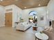 Inviting living room featuring high ceilings, large window, and comfortable seating at 2621 Spalding Dr, Las Vegas, NV 89134