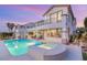 Backyard oasis with a pool, spa, and covered outdoor living space, perfect for relaxation and entertaining at 2736 Botticelli Dr, Henderson, NV 89052