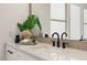 Bright bathroom featuring a vessel sink, sleek faucet, and decorative accents at 2736 Botticelli Dr, Henderson, NV 89052