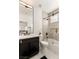 Modern bathroom featuring a shower/tub combination and a dark vanity at 2736 Botticelli Dr, Henderson, NV 89052