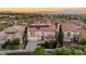 Beautiful two-story home with tile roof, desert landscaping and solar panels at 2736 Botticelli Dr, Henderson, NV 89052