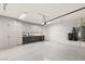 This spacious garage offers ample storage with built-in cabinets and epoxy flooring at 2736 Botticelli Dr, Henderson, NV 89052