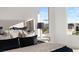 Close-up of the primary bedroom with comfortable bedding and scenic window view at 2736 Botticelli Dr, Henderson, NV 89052
