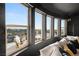 Bright picture windows frame views from the comfortable living space at 2736 Botticelli Dr, Henderson, NV 89052