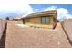 Backyard featuring a gravel yard with a patio and rear home exterior at 3125 Prairie Princess Ave, North Las Vegas, NV 89081