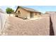 Low maintenance backyard featuring a patio and gravel at 3125 Prairie Princess Ave, North Las Vegas, NV 89081
