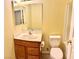 Bathroom with a wood vanity, sink, toilet, and shower over tub at 3125 Prairie Princess Ave, North Las Vegas, NV 89081