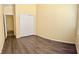 Bedroom view featuring hardwood flooring, closet, and open door to the next room at 3125 Prairie Princess Ave, North Las Vegas, NV 89081