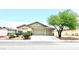 Charming single-story home featuring a three-car garage, desert landscaping, and a cozy, inviting facade at 3125 Prairie Princess Ave, North Las Vegas, NV 89081