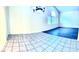 Open floor plan showing tiled entryway into the living room with high ceilings and lots of natural light at 3125 Prairie Princess Ave, North Las Vegas, NV 89081