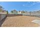 Open backyard space with gravel landscaping and block wall fencing at 356 Gulfport Ct, Las Vegas, NV 89145