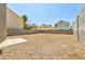 Spacious backyard with gravel landscaping, perfect for creating your own outdoor oasis at 356 Gulfport Ct, Las Vegas, NV 89145