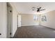 Comfortable bedroom with carpet, two windows, and ceiling fan for natural light and ventilation at 356 Gulfport Ct, Las Vegas, NV 89145