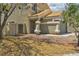 Inviting home with a covered entryway, two-car garage, and gravel landscaping at 356 Gulfport Ct, Las Vegas, NV 89145