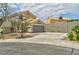 Charming two-story home with attached garage, driveway, and well-kept landscaping at 356 Gulfport Ct, Las Vegas, NV 89145
