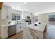 Bright kitchen featuring marble countertops, stainless steel appliances, and ample storage at 356 Gulfport Ct, Las Vegas, NV 89145
