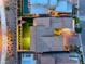 Stunning aerial view showcases a luxury home with a private pool, manicured landscaping, and elegant outdoor lighting at 365 Crown Mesa Ave, Las Vegas, NV 89138