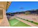 Enjoy this backyard view with lush greenery and a serene setting, perfect for relaxation and entertaining at 365 Crown Mesa Ave, Las Vegas, NV 89138
