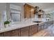 Gourmet kitchen with premium appliances, marble countertops, and custom cabinetry with ample light at 365 Crown Mesa Ave, Las Vegas, NV 89138