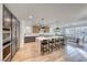 Spacious kitchen and dining area featuring a large island, modern appliances, and ample seating at 365 Crown Mesa Ave, Las Vegas, NV 89138