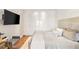 Bright bedroom with storage, TV, and modern furnishings at 3750 Las Vegas Blvd # 3006, Las Vegas, NV 89158