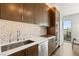 Modern kitchen with stainless steel appliances and tiled backsplash at 3750 Las Vegas Blvd # 3006, Las Vegas, NV 89158
