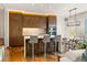Modern kitchen features wood cabinetry, a center island with seating, and stainless steel appliances at 3750 Las Vegas Blvd # 3006, Las Vegas, NV 89158