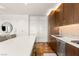 Modern kitchen with sleek cabinets, mosaic backsplash, stainless steel appliances, and a spacious island at 3750 Las Vegas Blvd # 3006, Las Vegas, NV 89158