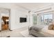 Spacious main bedroom with built-in storage, city views, and a stylish canopy bed at 3750 Las Vegas Blvd # 3006, Las Vegas, NV 89158