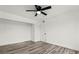 The bedroom offers a ceiling fan, an expansive closet space, and neutral tones at 4046 Bridgeview Cir, Las Vegas, NV 89147