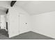 This bedroom features a neutral color scheme, an attached closet, and a doorway at 4046 Bridgeview Cir, Las Vegas, NV 89147