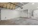 Spacious garage with shelving and ample room for parking and storage, perfect for a functional lifestyle at 4046 Bridgeview Cir, Las Vegas, NV 89147