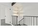 Hallway featuring a stairway and doorway at 4046 Bridgeview Cir, Las Vegas, NV 89147